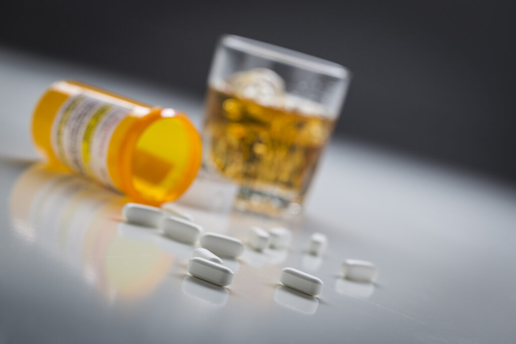 Shows drugs and alcohol to represent substance abuse and addiction which is treated by an in-person therapist in Ellcott City, Maryland.